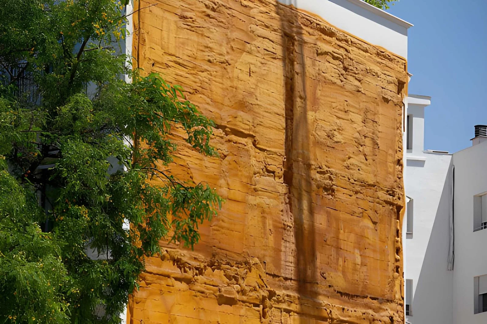 Textured EIFS Dryvit finish on building exterior installed by ABC Masonry and Stucco Contractors NYC